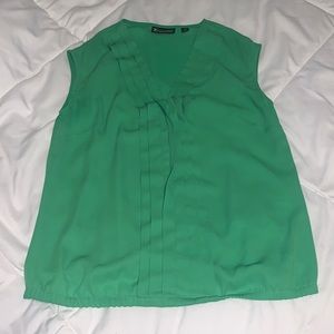 Green sleeveless blouse